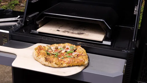 Master The Art Of Homemade Pizza On A Stone: Tips For A Crispy Crust